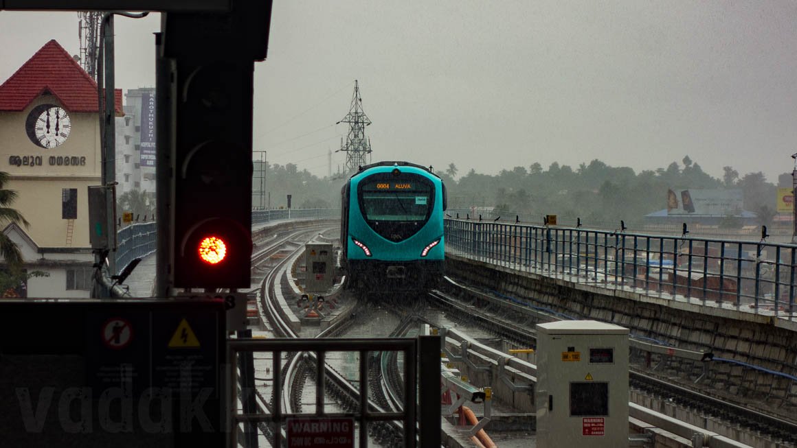 Kochi Metro Train Approaching Aluva Station Through Heavy Rain