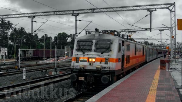 Trivandrum-Chennai-Superfast-Mail-train-WAP7-30555-Kottayam railway station grey