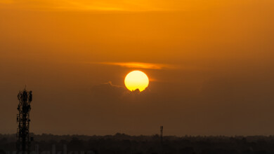 Sunset in Kerala Sun looks like a big yellow ball on fire liquid gold